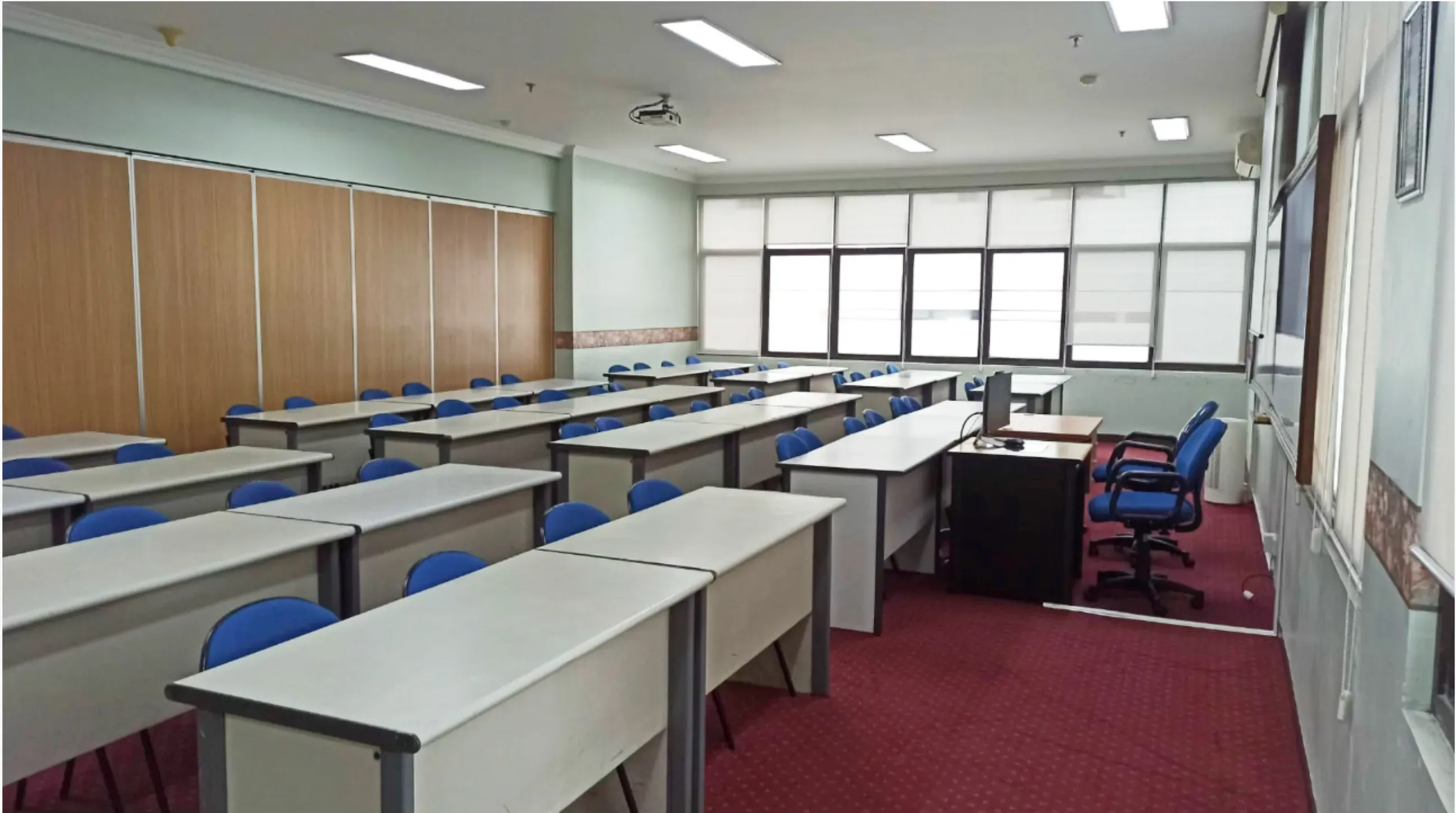 Universitas Trisakti classroom with blue chairs